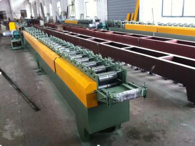 China 65mm rolling shutter slat forming machine with 37 forming steps with 11KW, 22m frame for sale