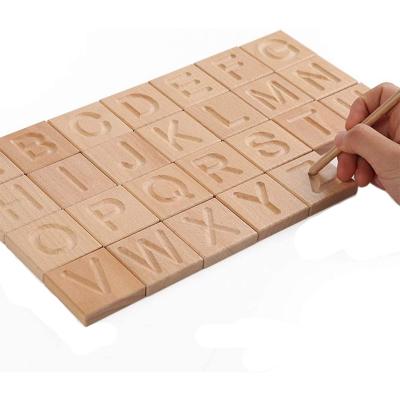 China Learning Letters Wholesale Montessori Letter Learning Toy Wood Alphabet Puzzles Wooden Alphabet Tracing Board for Preschool Kids for sale