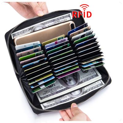 China Waterproof RFID Blocking Credit Card Case Holder Security Travel Wallet, Genuine Leather Credit Card Holder Zipper Wallet for sale