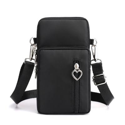 China High Quality Travel Shoulder Strap Sport Armband Wallet Custom Logo Small Cross - Nylon Body Wallet Phone Bag Cell Phone Purse For Women for sale