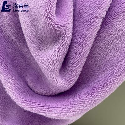 China Antistatic In Stock 2mm Pile Length Polyester Flannel Plush Toy Fabric for sale