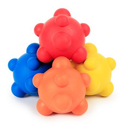 China Stocked Popular Creamy Rubber Dog Toys Irregular Chew Toy Fun Bite Resistant Dog Toy Ball Bouncing Ball 7cm Dog Toy for sale