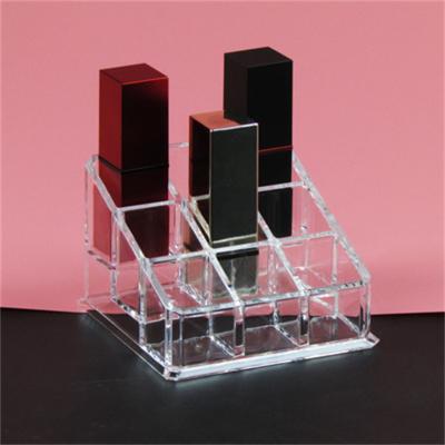 China Acrylic or Customized Black Plastic Cosmetic Display Stand Countertop Display Acrylic Lip Balm Holder Lipstick for sale