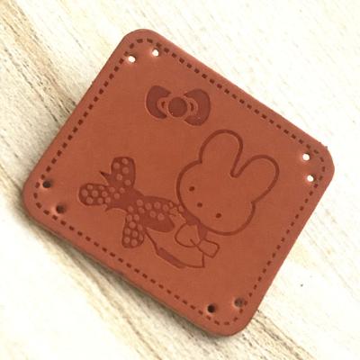 China Viable Custom Leather Patches Leather Beanie Labels Pu Leather Patch for sale