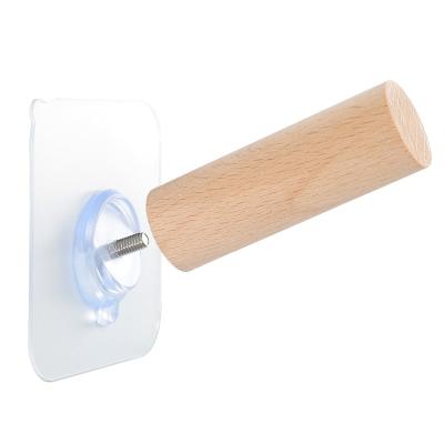 China Viable Price Creative Good Hole Free Wall Sticking Supplies Seamless Wall Hanging Storage Hook Coat Hanger Solid Wood Dough Hook for sale