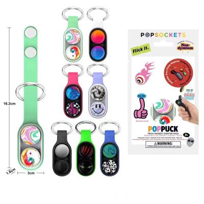 China 2023 New Wholesale Magnetic Puck Fidget Stress Relief Toy Poppuck Decompression Sense Key Chain Noise Toy for sale