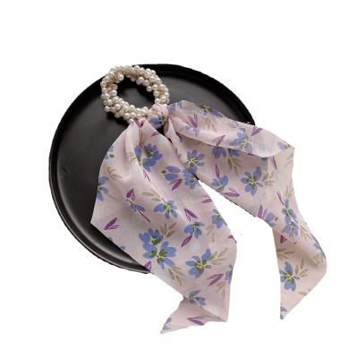 China Fashion Girls Daily Hair Ties Beads Floral Hair Scrunchies With Long Tail For Women Hair Accessories for sale