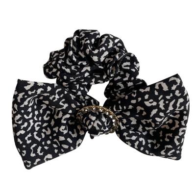 China Fashionable High Tenacity Adult Women Hair Decoration Leopard Printing Bow Knot Hair Scrunchies CZ Stone Hair Ties for sale