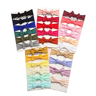 China Hot Soft Hair Bands Hair Decoration Accessories Amazon Sale Elastic Hairbands Solid Color Bow Knot Headbands Baby Kids Baby Hair Wrap for sale