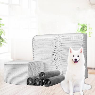 China Leak Proof Carbon Stocked Dog Puppy Pads Ultra Absorbent Biodegradable Bamboo Dog Diaper Pee Pads Pet Training Disposable for sale