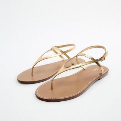 China Fashion trend 2022 new summer women's shoes gold strap clip-toe flat beach sandals for sale