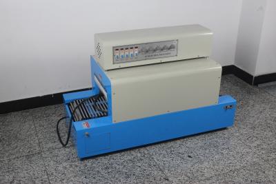 China Model no BS-250 Shrink  packaging machine, Steel of material,Blue with White color Tunnel  size 250x150mm for sale