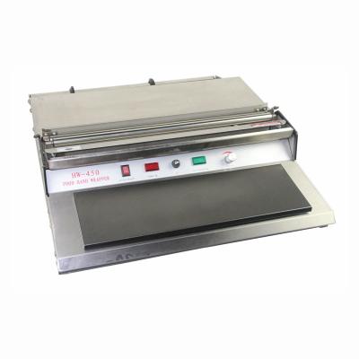 China fresh food hand wrapping packing machine HW-450 for sale