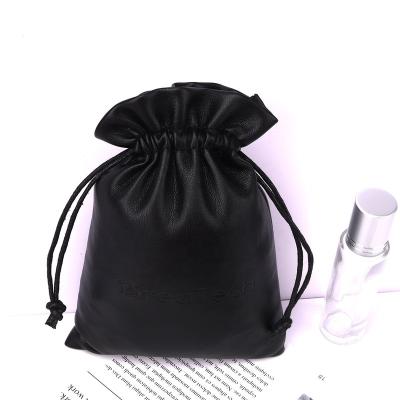 China Wholesale Natural Emboss PU Black Leather Earphone Faux Leather Bag Drawstring Pouch Tote Bag for sale