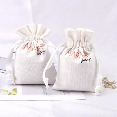 China Safety Logo Printing Custom 8oz Canvas Drawstring Skin Care Product Bag Gift Packaging Makeup Cotton Cosmetic Pouch for sale