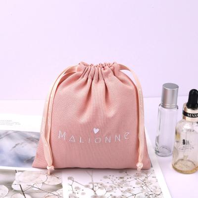 China Custom Canvas Drawstring Gift Cotton Safety Embroidery Cosmetic Bag With Logo Printed Pouch Pink Cotton Dust Makeup for sale