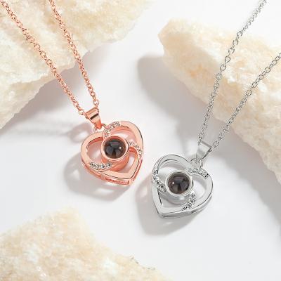 China TRENDY Fashion Jewelry Projection Necklace Custom Photo Crystal Rhinestone Pendant Heart Necklace For Couple for sale