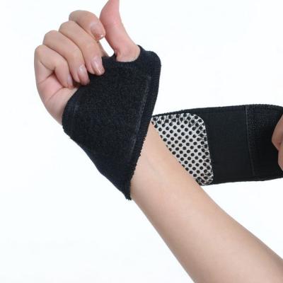 China Adjustable Wrap High Quality Breathable Elastic Compression Wrist Support Brace Fit For Left Hand And Right Hand for sale