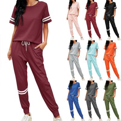 China Wholesale OEM Loose Short Sleeve Breathable Striped Top Tracksuit Jogging 2 Piece Pants Sets Women for sale