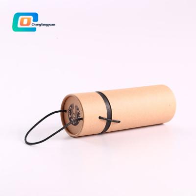 China Custom Cylinder Packaging Box Biodegradable Kraft Paper Tube With String Holder Cardboard Tube Container For Underwear Clothes for sale