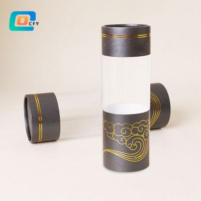 China Biodegradable PVC Coating Tape Hanging Package For Earphone With Clear Cover Kraft Paper Round Paper Tube for sale