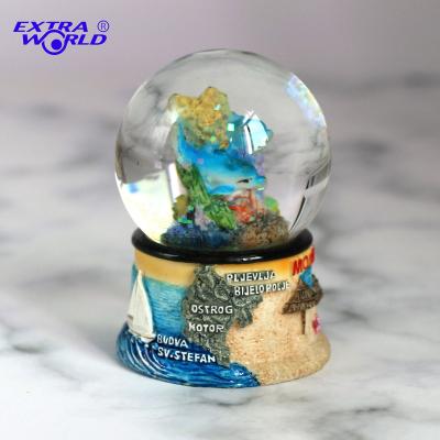 China Europe Factory Cheap Custom Montenegro 3D Resin Painted Fishing Waters Globe Souvenir Boat Water Globe for sale