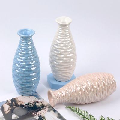 China Small Minimalist Fashionable Colorful Aromatherapy Stands Decorative Matte Delicate Ceramic Flower Bottle Vase On The Desk for sale