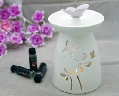 China New Modern Ceramic Spring Candle Holder Purple Butterfly Style Oil Lamp Burner is a good choice for gift giving for sale