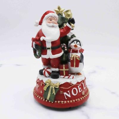 China Europe Traditional Resin Father Christmas Santa Claus And Winter Penguin With A Sack Decorative Gift for sale