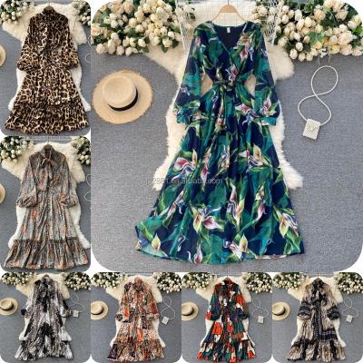 China New Spring Vacation Chiffon Print Dress Anti-Static Swing Beach Dress / Big V-Neck Long Sleeve Waist Strap Summer Beach. for sale