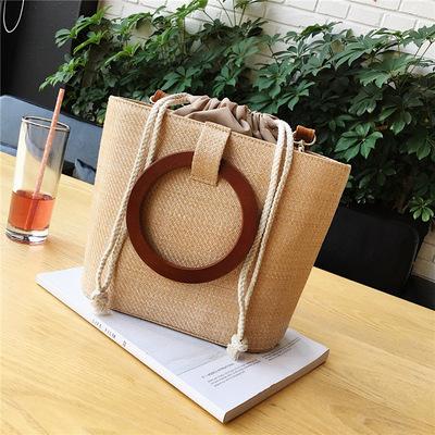 China 2022 Madame Straw Bag Circle Handle Summer Beach Tote Bag Handbags For Women With Leather Top Strap for sale