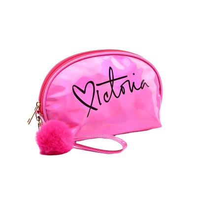 China Fashion Wholesale Customized Korean Logo Letter Plush Ball Laser Makeup Case Cosmetic Bag For Ladies Pouch for sale