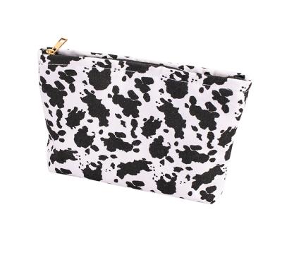 China Cute Fashion Casual Large Capacity Portable Canvas Cow Pattern Women's Cosmetic Bag Pouch for sale