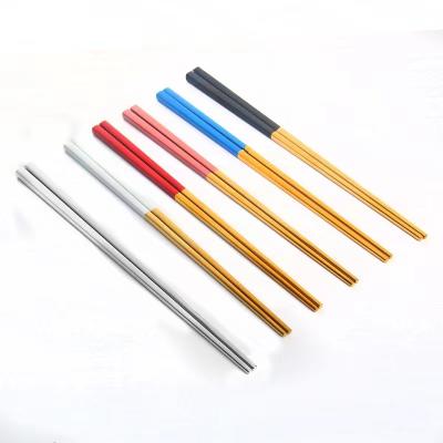 China Sustainable Nordic portuguese printed color handle stainless steel gold chopsticks with custom box for sale