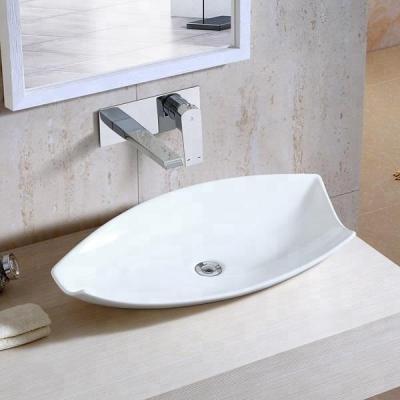 China High Tempreture Ceramic Height Large Size Ceramic Wash Basin Sanitary Ware Table Mounted Irregular Western Bathroom Sinks for sale