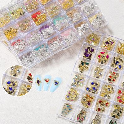 China Nail Art Rhinestone Charms 3D Design Metal Alloy Nail Art Jewelry Zircon Decoration Designer Nail Charms for sale