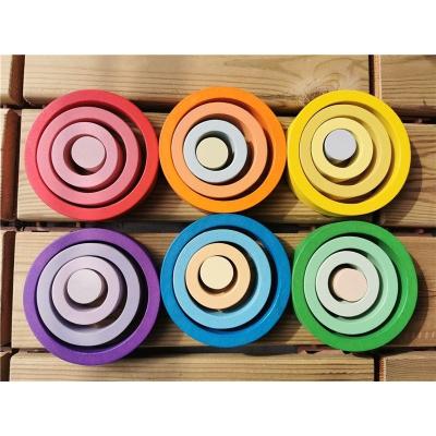 China 100% Eco-Friendly Wooden Rainbow Nests Ring Stacking Open Loose Blocks Pieces Montessori Toys For Children for sale