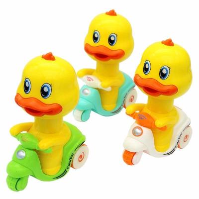 China Cartoon STUFFED Small Duck Toy Press-Type Motorcycle Toy Pull Yellow Support Children's Educational Friction Operated Toy for sale