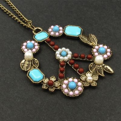 China TRENDY Retro Inlaid Gemstones Turquoise Necklace Bead Flowers Peace Sign Necklace Pendant Wholesale for sale