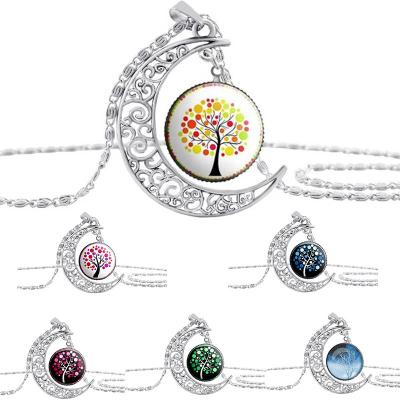 China TRENDY Tree Of Life Glass Pendant Necklace Moon Time Gemstone Necklace Sweater Chain For Women for sale