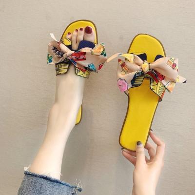 China Fashion trend popular summer women where wholesale slip sandal with bow decoration ladies slipper printed flat slides for girl for sale