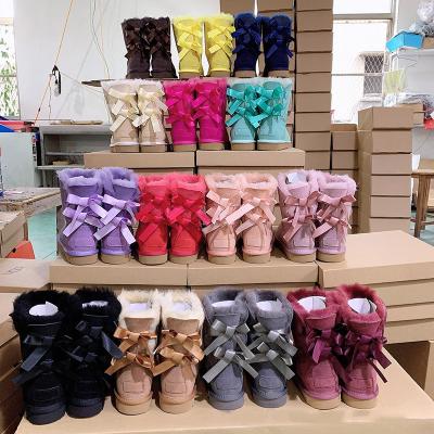 China Fashion Trend Women Kids Sheepskin Ladies Winter Snow Ribbon Fur Boots With Bows for sale