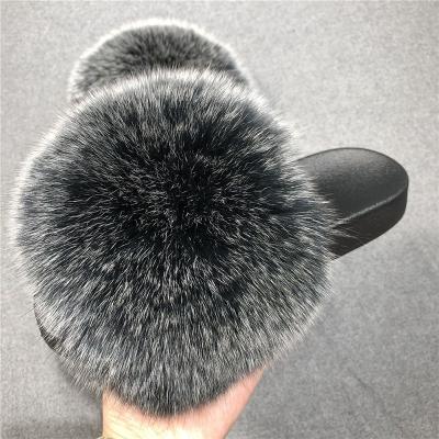 China Fashion Trend Female Fur Slippers Real Big Freeze Fluffy Soft Fur Slipper Bag Raccoon Slider Sandals Girl Fox Fur Outdoor Slides For Women for sale