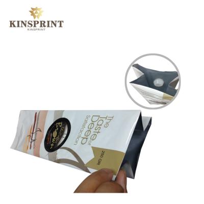 Cina 250g 500g food grade resealable flat bottom ziplock coffee bag with valve in vendita