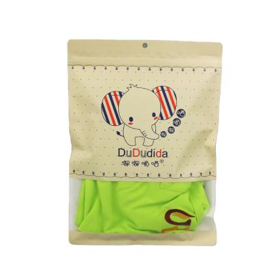 China Eco friendly white kraft paper bag for kids clothes bags/bags for packaging clothes/baby clothes packaging bag Te koop