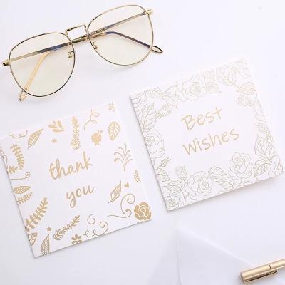 China Christmas Gift Certificate White Gold Recyclable Paper Matte Hot Stamping For Christmas Blessing Card for sale