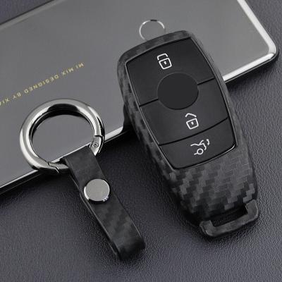 China High Quality Carbon Fiber Silicone Key Case Cover Chain Smart FOB Fit For Mercedes Benz C E Car Key Case for sale