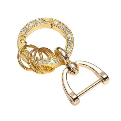 China Creative Key Holder Diamond Broken Ring Keychain DIY Personalized Accessories Simple Car Calfskin Hug Swivels and Women Key Chain for sale