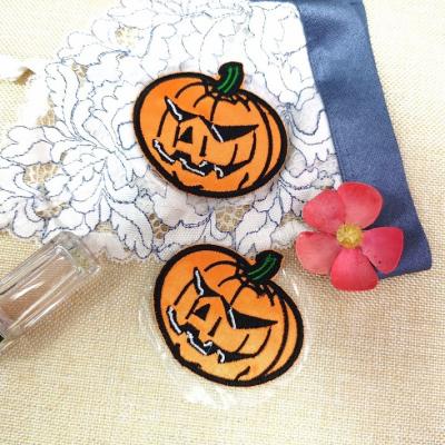 China Custom Reusable Breast Invisible Pumpkin Pies Halloween Embroidery Promotion Bra Nipple Covers For Girls for sale