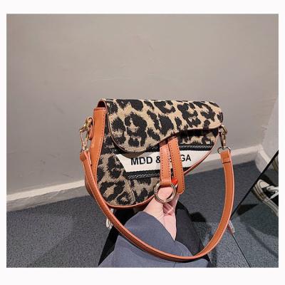 China Newspaper used 2021 hot luxury handbags real Leopard Logo luxury handbags for sale support drop shipping bags for sale